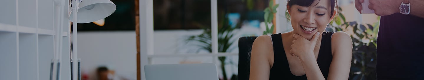 An AmTrust employee working on coverage for a small business customer. An AmTrust employee working on coverage for a small business customer.