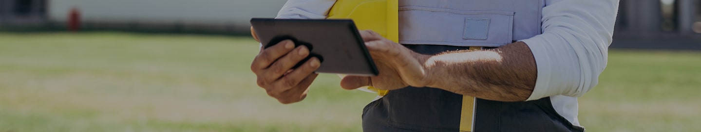 A contractor purchases insurance from Liberty Mutual on their tablet.