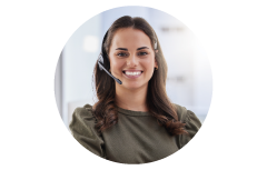 Agent smiling answering a client's call.