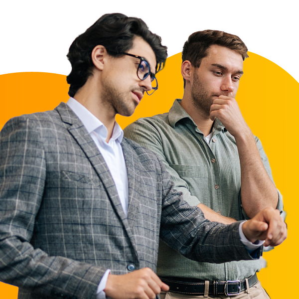 A car dealer discusses a vehicle with a prospective buyer.