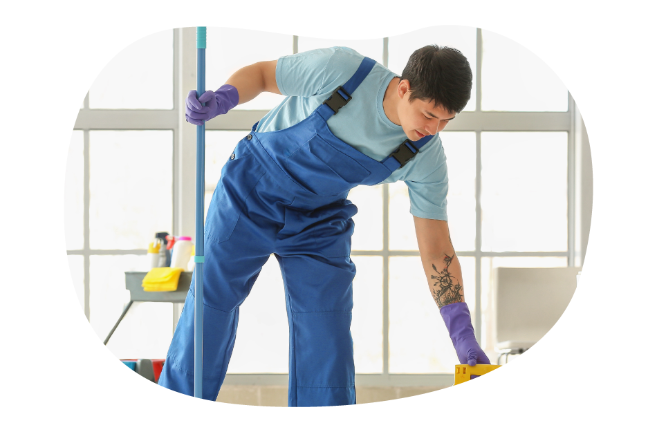 A janitor mopping the floors of a client's office.