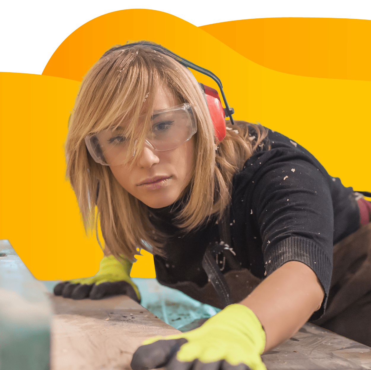 Carpenter measuring a piece of wood.