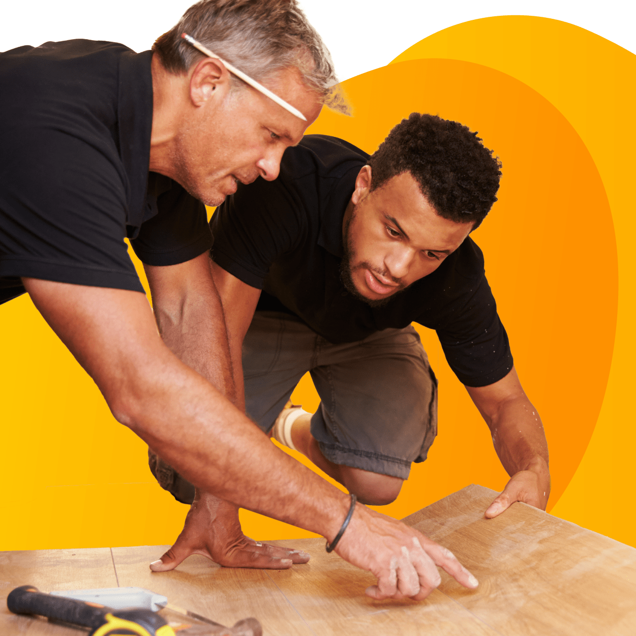 Installation contractors evaluating floor boards.