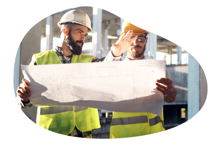 A general contractor discussing their construction plan with a subcontractor