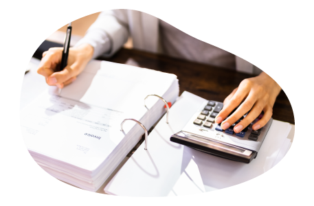 A construction contractor calculating insurance costs. A construction contractor calculating insurance costs.
