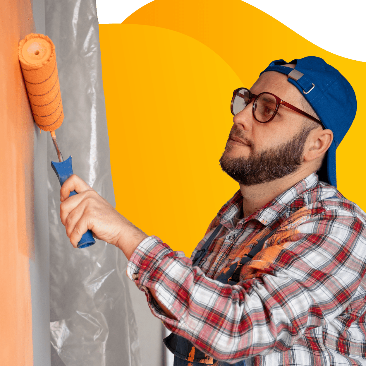 Painter rolling new coat of paint on a wall.