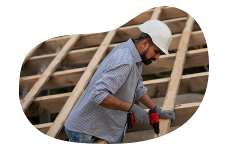 Roofing professional installing materials