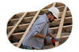 Roofing professional installing materials.