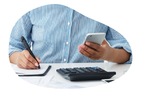 A consultant calculating business insurance costs. A consultant calculating business insurance costs.