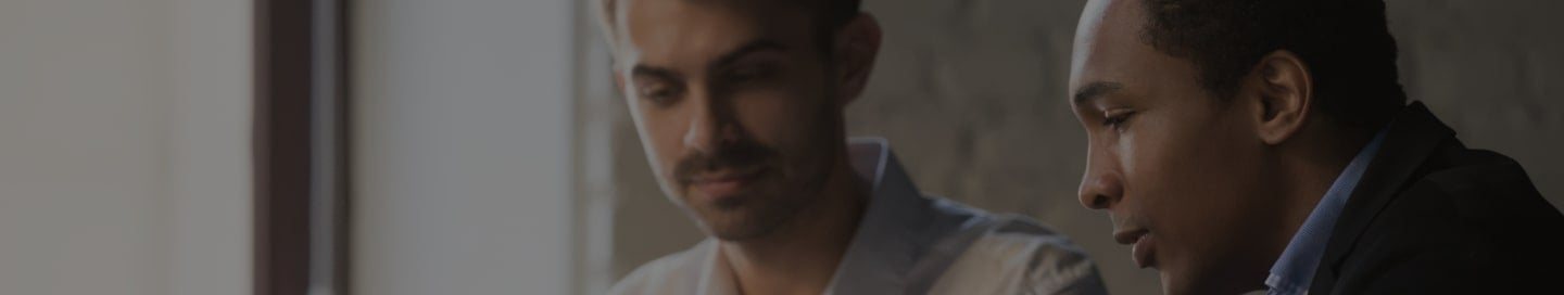 A management consultant reviewing information with a client.