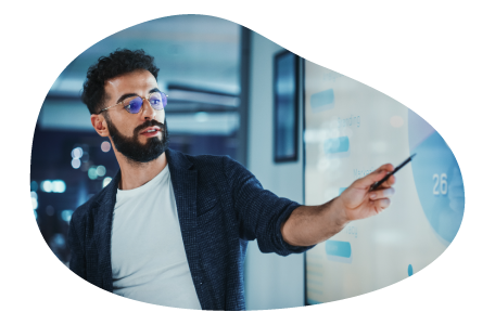 A marketing consultant showing projections to their client