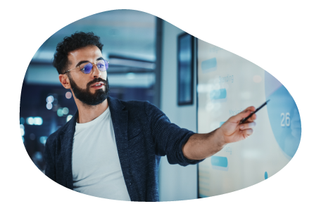 A marketing consultant showing projections to their client A marketing consultant showing projections to their client