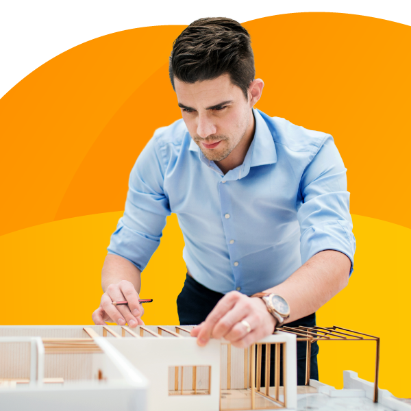 An architect working on a model for their latest office development project