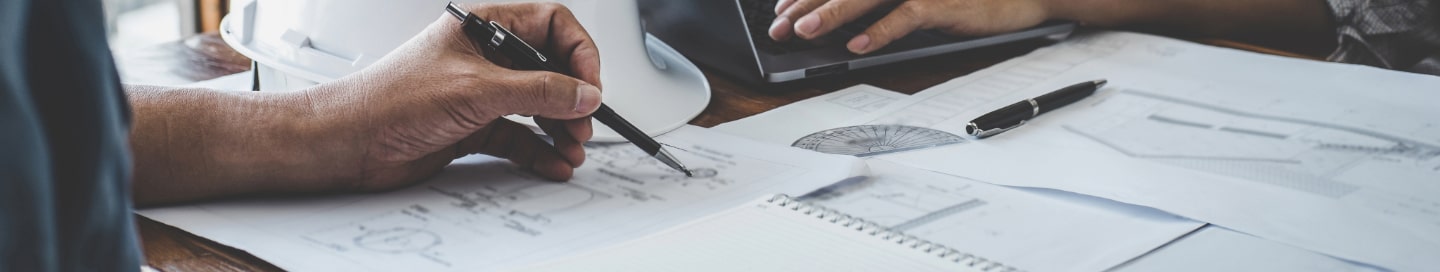 Two engineers design a model for a client project