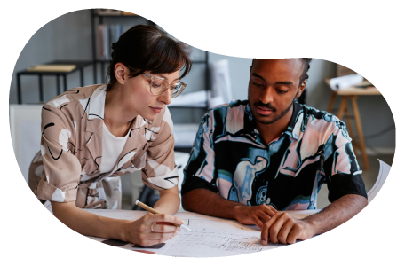 An interior designer consulting with a client. An interior designer consulting with a client.