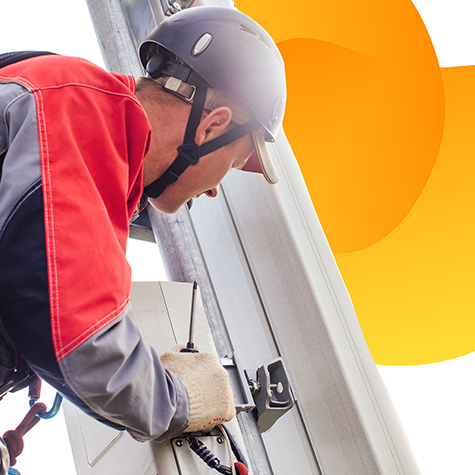 Technician adjusting cables.