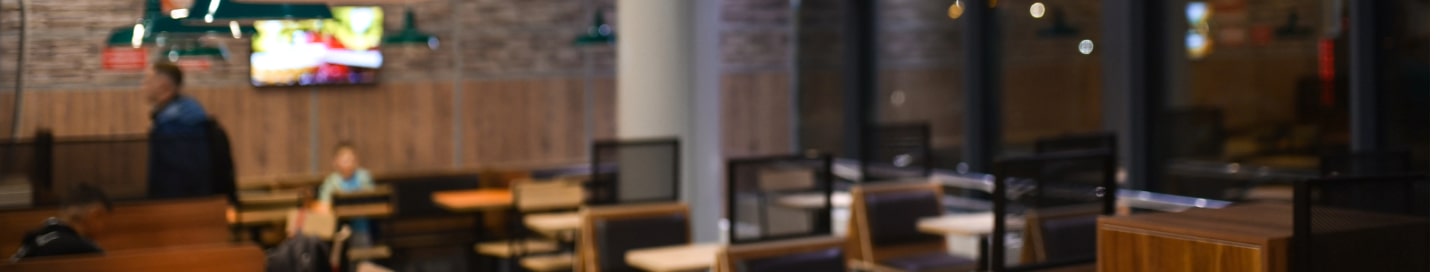 Ambient coffee shop scene with chairs and tables