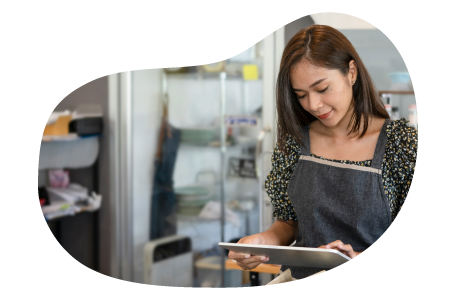 Fast food worker holding an iPad Fast food worker holding an iPad