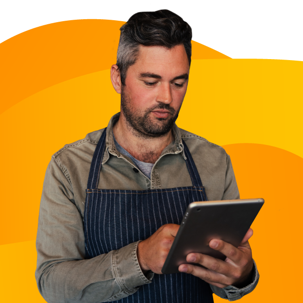 Fast food worker holding an iPad