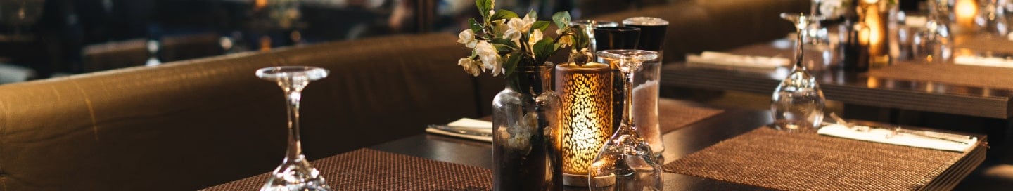 A table setting at a sit-down restaurant. A table setting at a sit-down restaurant.