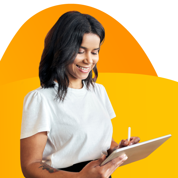 A restaurant owner writing on a tablet.