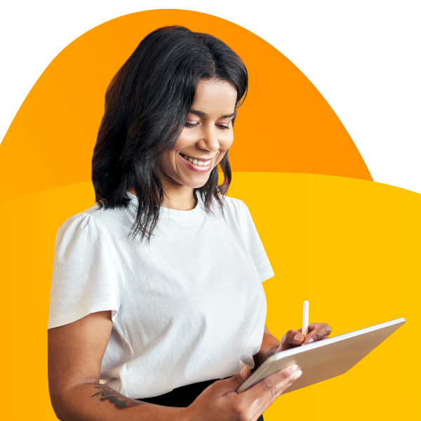 A restaurant owner writing on a tablet.