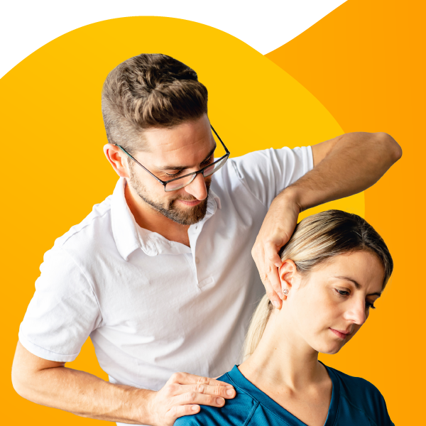 A chiropractor makes an adjustment to a patient's neck.