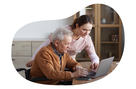 A home healthcare provider speaking with a patient. A home healthcare provider speaking with a patient.