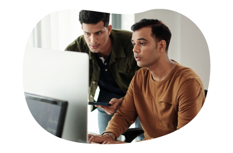 App developers looking at a computer screen.