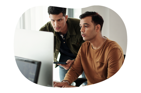 App developers looking at a computer screen.