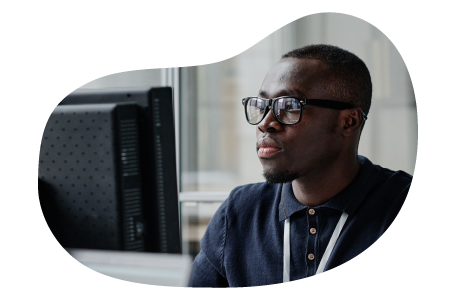 App developer looking at a computer screen. App developer looking at a computer screen.