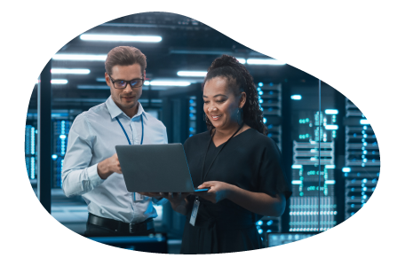 Employees at a cloud computing company working on a laptop.