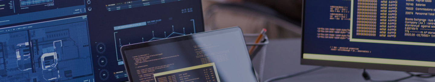 Data analysts reviewing data at a desk.