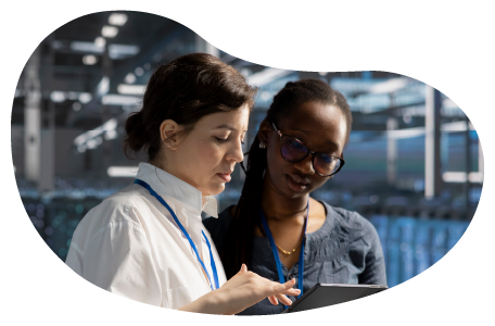 Two data analysts reviewing data.