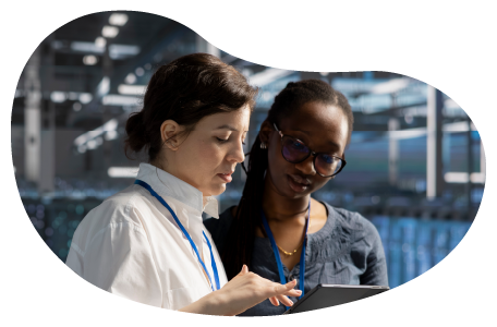 Two data analysts reviewing data.