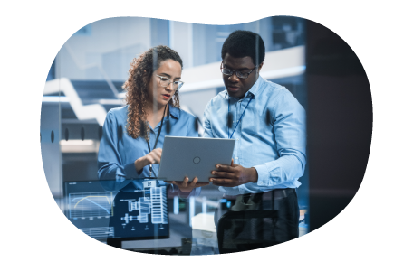 Data scientists reviewing findings on a laptop.