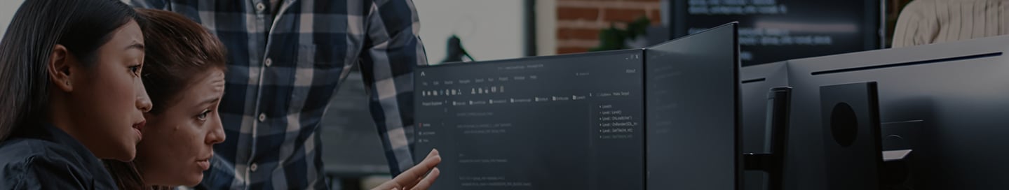 Employees working together at an edtech company. Employees working together at an edtech company.