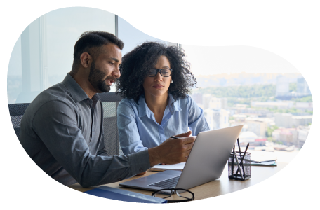 IT consultant and client examining a laptop. IT consultant and client examining a laptop.