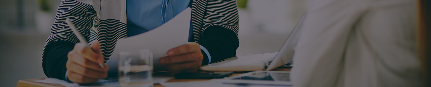 IT staffing agency employee interviewing a client. IT staffing agency employee interviewing a client.