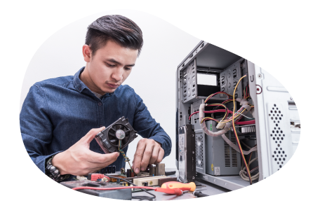 A PC builder assembling the PC of a desktop computer A PC builder assembling the PC of a desktop computer
