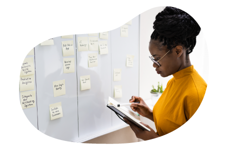 IT project manager putting together a project plan. IT project manager putting together a project plan.