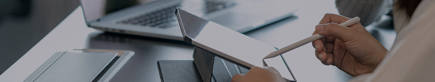 SEO and SEM consultants at a desk looking at data.