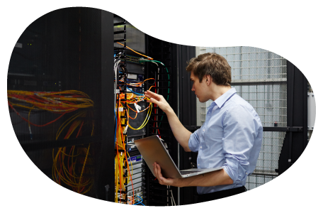 System integration technician evaluating a wired infrastructure. System integration technician evaluating a wired infrastructure.