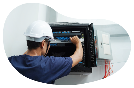 Employee installing telecom cables.