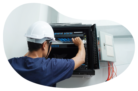 Employee installing telecom cables.