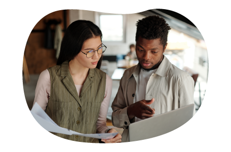 Web developers coding on laptop.