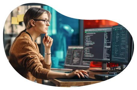 Web developer reviewing website programming code on a computer.