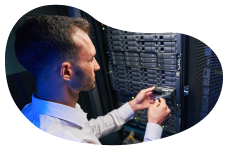 An employee working on a server.