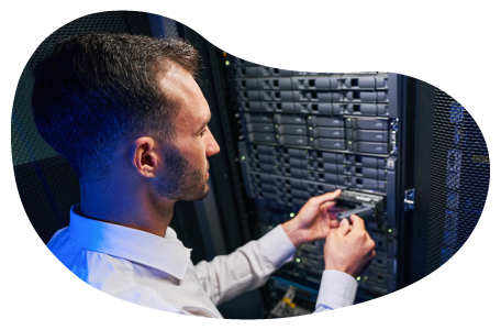 An employee working on a server.