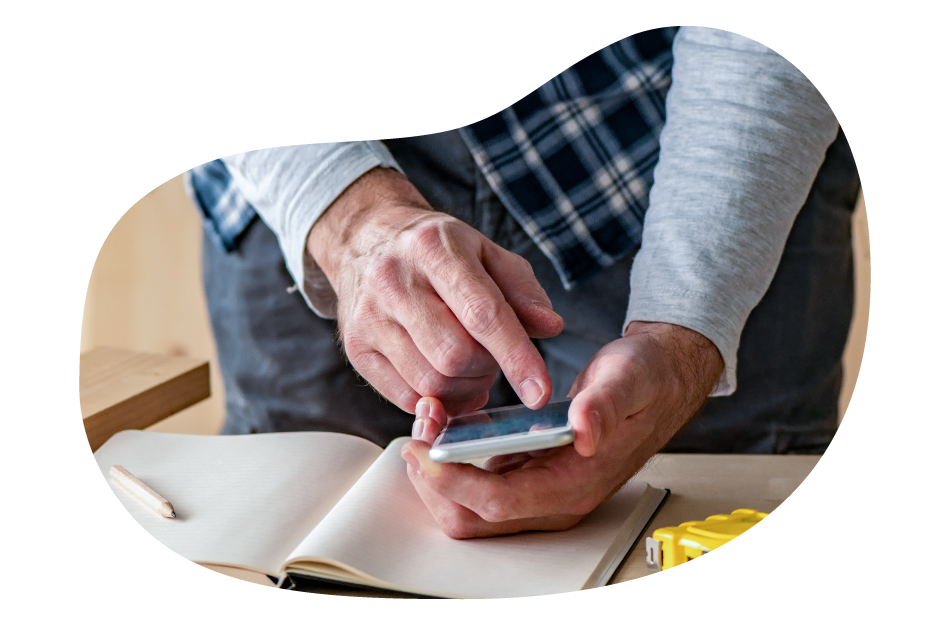 The owner of a landscaping business calculating insurance costs. The owner of a landscaping business calculating insurance costs.